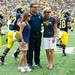 Michigan Head coach Brady Hoke along with his wife Lora and daughter Kelly pose for a photo before the start of home opener, Saturday, Aug, 31.
Courtney Sacco I AnnArbor.com  